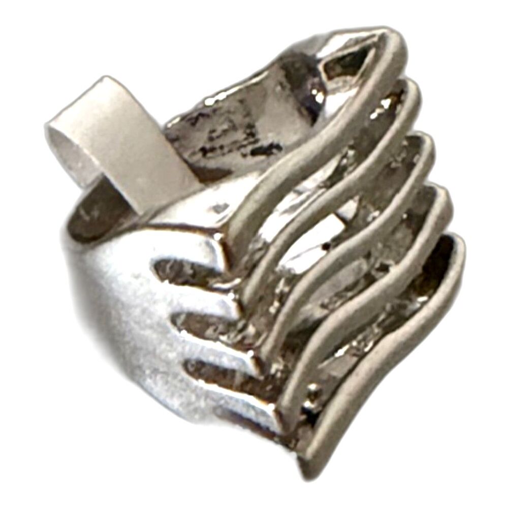 NWT geometric design fashion ring on a silver tone metal alloy band. Size: 7.5